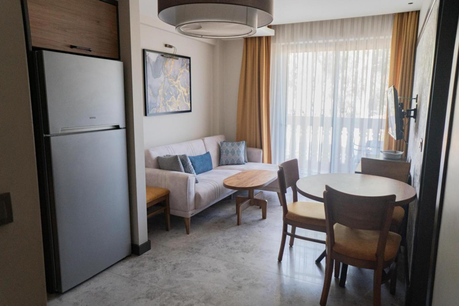 Kalender Pansion Aparthotel Фетие Екстериор снимка